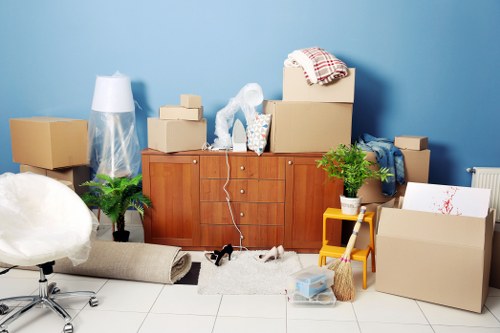 Furniture and boxes prepared for local removal services