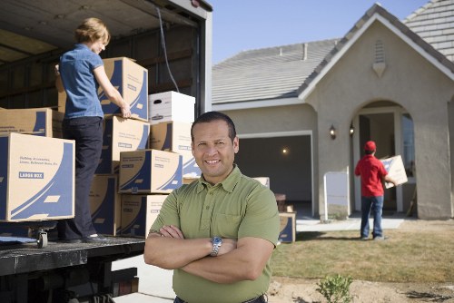 Packed boxes and household items ready for relocation