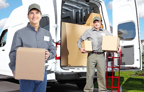 Packed office equipment prepared for relocation in a South Kensington workplace