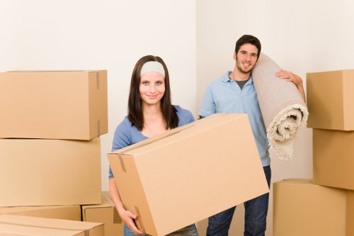 House movers handling stairs in a South Kensington apartment building