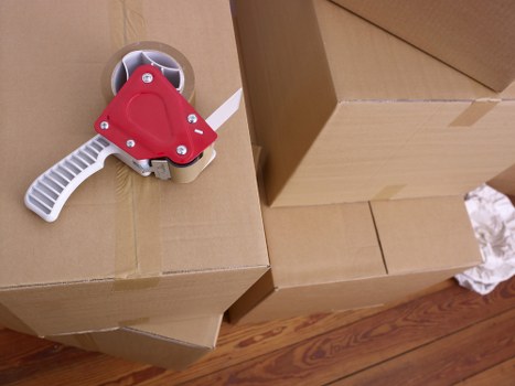 Local moving team handling fragile items during a South Kensington move