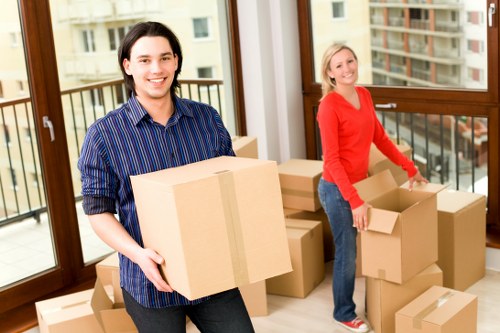 Packed office furniture and equipment ready for a South Kensington commercial move
